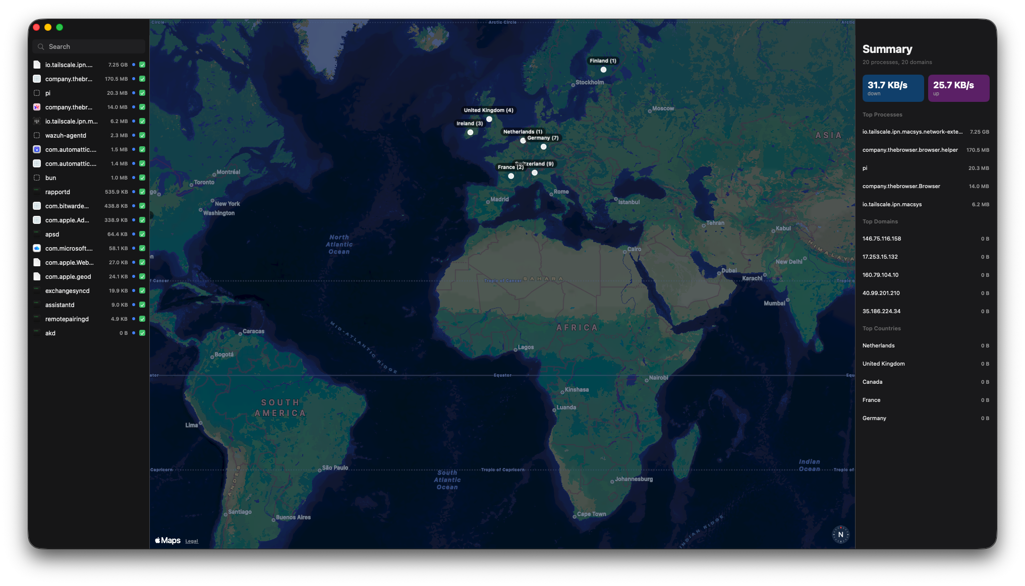 FreeSnitch monitor showing a world map of active outbound connections and per-process traffic totals